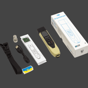 Digital breathalyzer kit with accessories and packaging on a gray background.